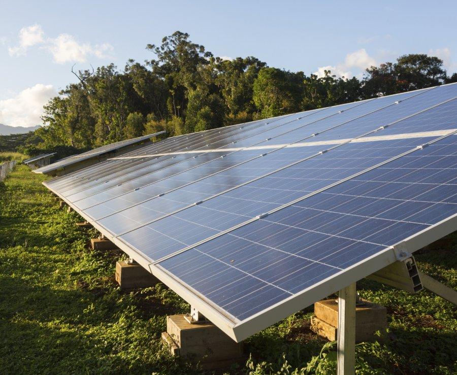 Large industrial solar power panels installation in hot tropical environment.