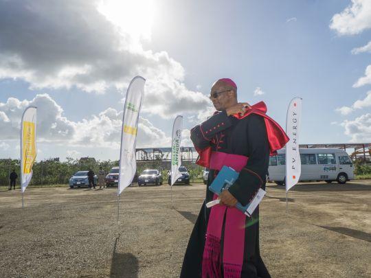 Priest during the inauguration of the solar plant at the airport Antigua.