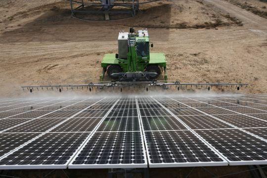 View on a machine cleaning solar panels.